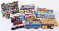 Seven boxed friction driven and wind-up tinplate trains, 1960s/70s