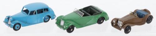 Three Dinky toys cars