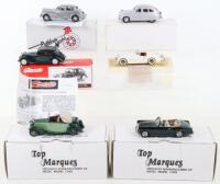 Six white metal model cars