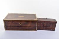 ^ An early Victorian rosewood and brass mounted rosewood writing slope