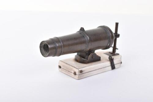 ^ Victorian model of a bronze carronade