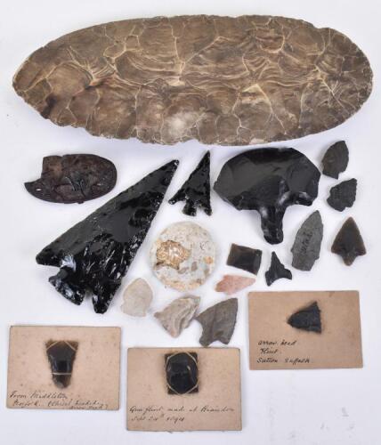 Stone Age and later, a group of knapped flint and obsidian arrow and spear heads and scrapers