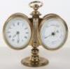 A late 19th century brass desk combination barometer and clock