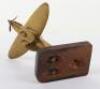 A brass model of a Spitfire in flight - 6
