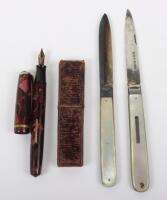 Two silver and mother of pearl fruit knives, with a 14ct nib Burnham fountain pen