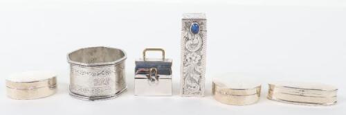 An Italian silver lipstick holder (.800), a silver napkin ring