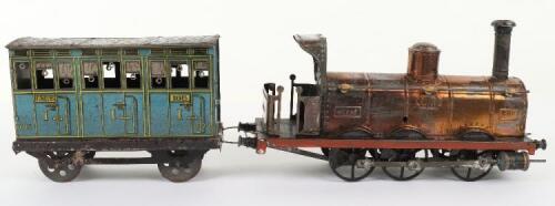 A rare C.R (Rossignol) tinplate 0-6-0 clockwork floor train &lsquo;Ouest&rsquo; and passenger coach, French circa 1890