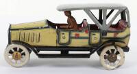 An early and good Distler tinplate friction driven four-seater tourer penny toy, German circa 1910