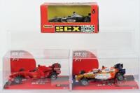 Two Boxed SCX F1 Model Slot Cars
