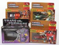 Four Hasbro Transformers G1 boxed action figures